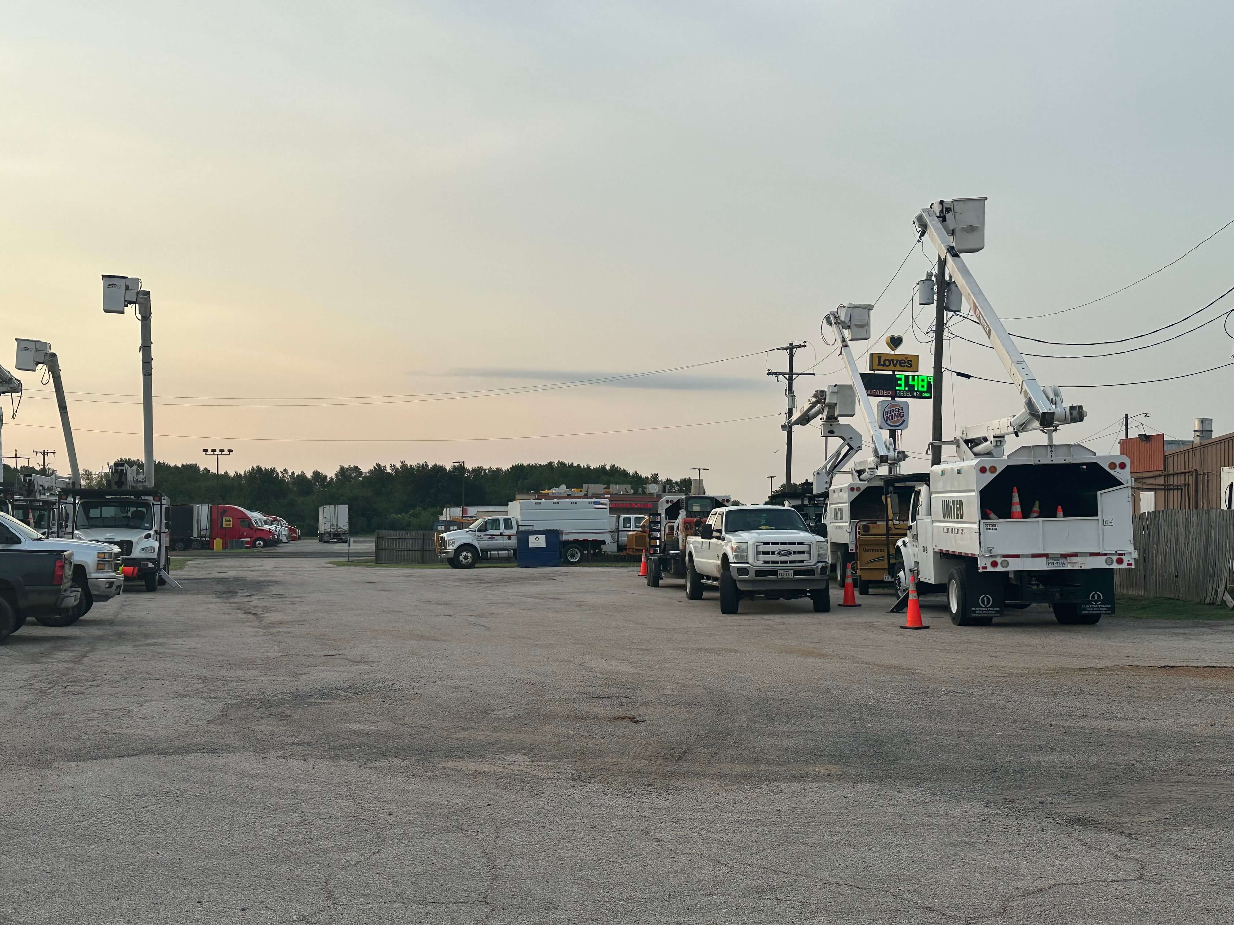 Large truck and trailer parking area at Apollo Lodge directly off Interstate 45